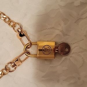 #5 Vintage Louis Vuitton lock and key #204